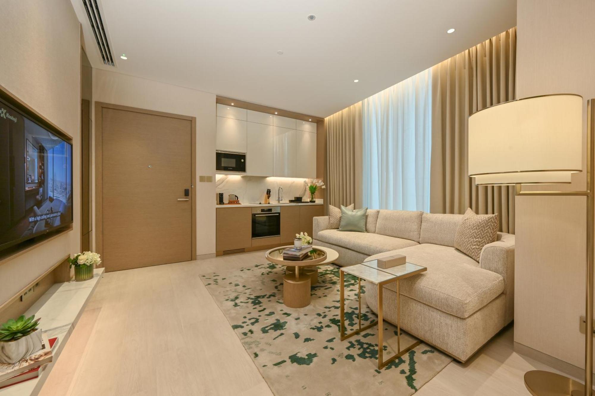 מלון מנאמה Onyx Rotana מראה חיצוני תמונה A living room at the Ritz-Carlton, DIFC